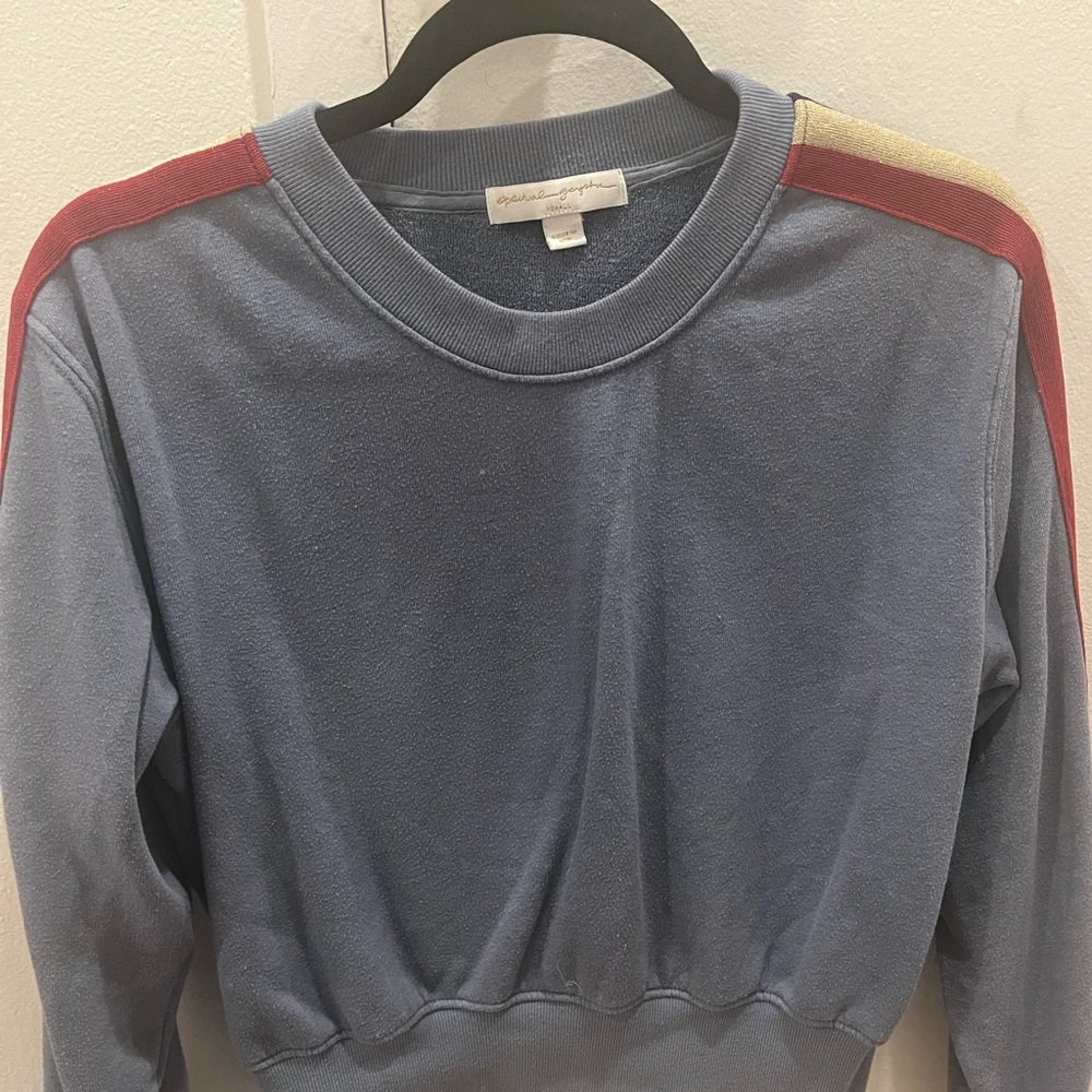 Spiritual Gangster blue sweater with shiny red, cream, and blue lining; size xs